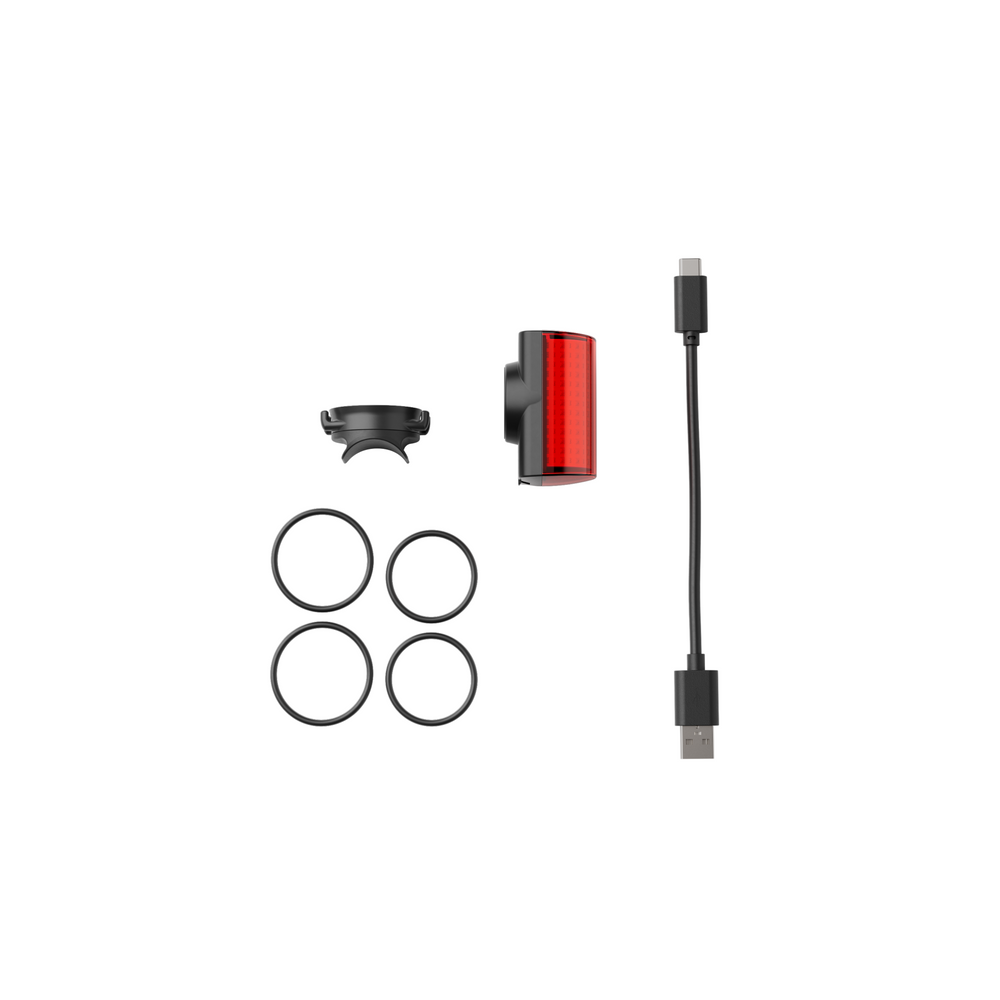 Contenido de la caja: luz trasera LED magnética Shapeheart, fijación elástica y cable de carga incluidos