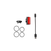 Contenido de la caja: luz trasera LED magnética Shapeheart, fijación elástica y cable de carga incluidos